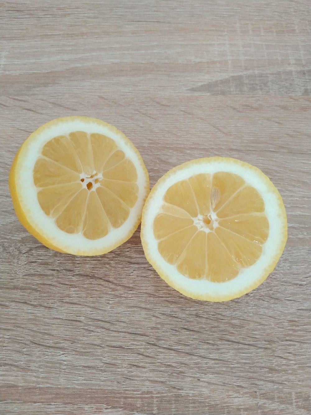 Lemon cut in half on a table